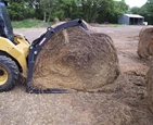 New Grapple moving hay